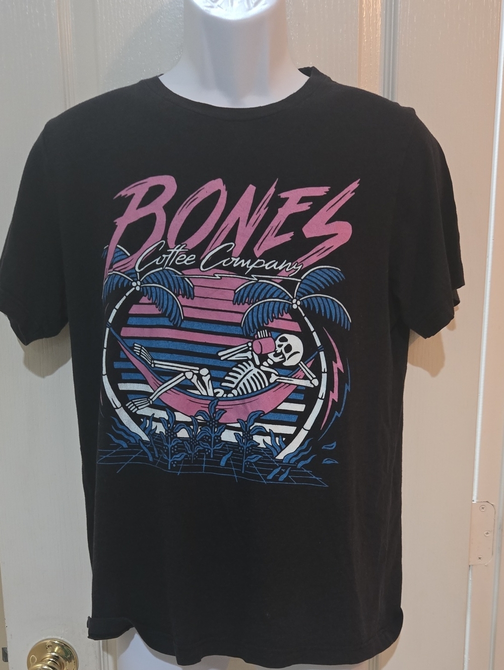 Bones Coffee Company Black T-Shirt Mens Medium Skeleton On Pink Hammock